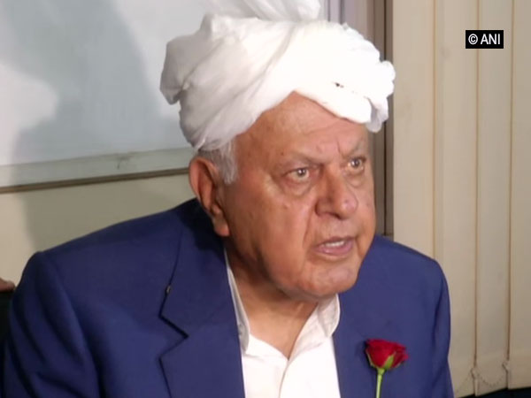 National Conference chairman Farooq Abdullah speaking to reporters in Jammu on Friday.