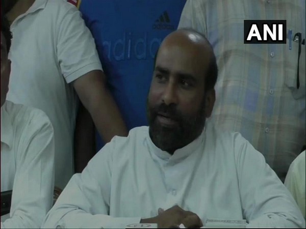 Father Anthony talking to media