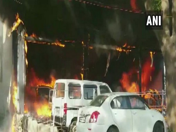 Visuals from the car showroom which caught fire in Betul on Sunday. Photo/ANI