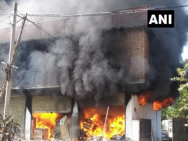 Visual of the fire which broke out at the godown in Mandi on Saturday. Photo/ANI