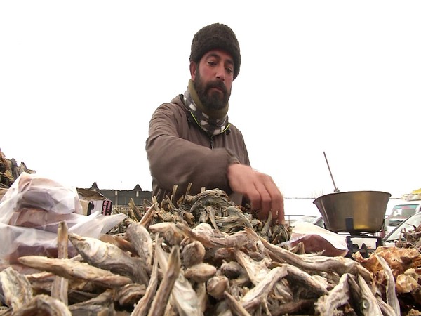 A Kashmiri selling hoggard in a local market. (Photo/ ANI)