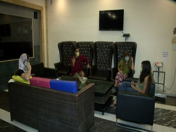 Foreign tourists at a Delhi hotel on Sunday. Photo/ANI