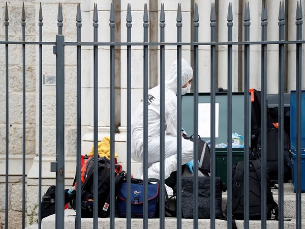 A forensic specialist inspects the scene of a reported knife attack at Notre Dame church in Nice, France, October 29, 2020. (Picture Credit: REUTERS)