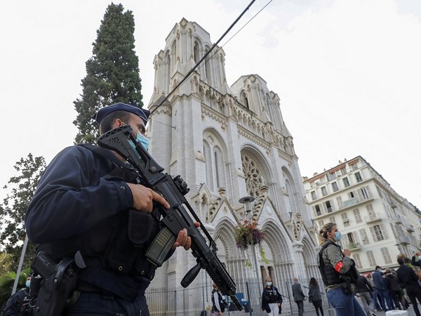 A police officer stands near Notre Dame church, where a knife attack took place, in Nice, France October 29, 2020. (Photo Credit: REUTERS)