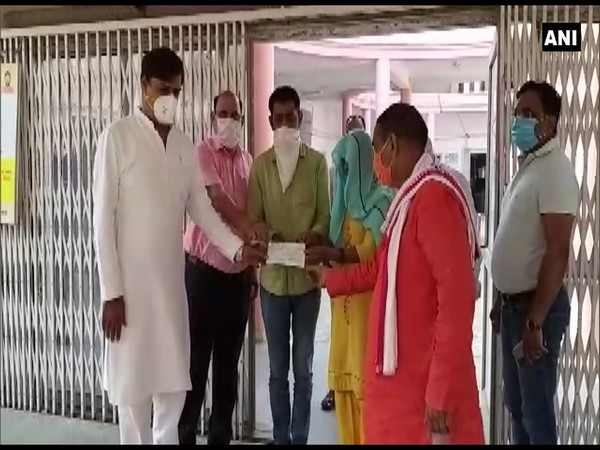 Rajya Sabha MP, Dadri MLA, Additional DM handed over Rs 15 lakh cheque to family of late Sudiksha Bhati on Sunday. (Photo/ANI)