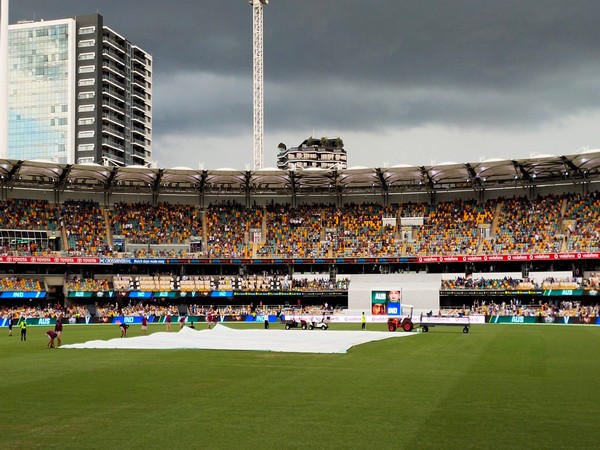 The pitch has been covered at The Gabba (Photo/ BCCI Twitter)