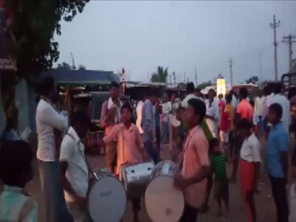 Residents of Asuti, the native village of Cyberabad Police Commissioner VC Sajjanar, celebrating the police action against the rape accused on Sunday. Photo/ANI