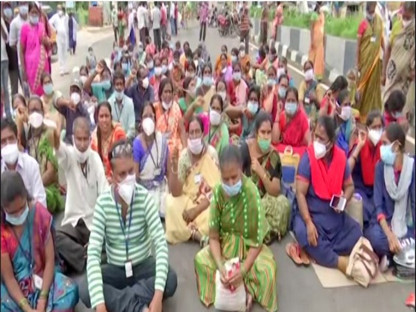 Class IV outsourcing health workers stage a protest in Gandhi Hospital, Hyderabad here on Tuesday. (Photo/ANI)
