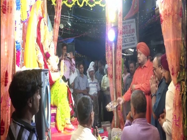 People offering prayers to idol of lord Ganesh in Karol Bagh on Saturday. Photo/ANI