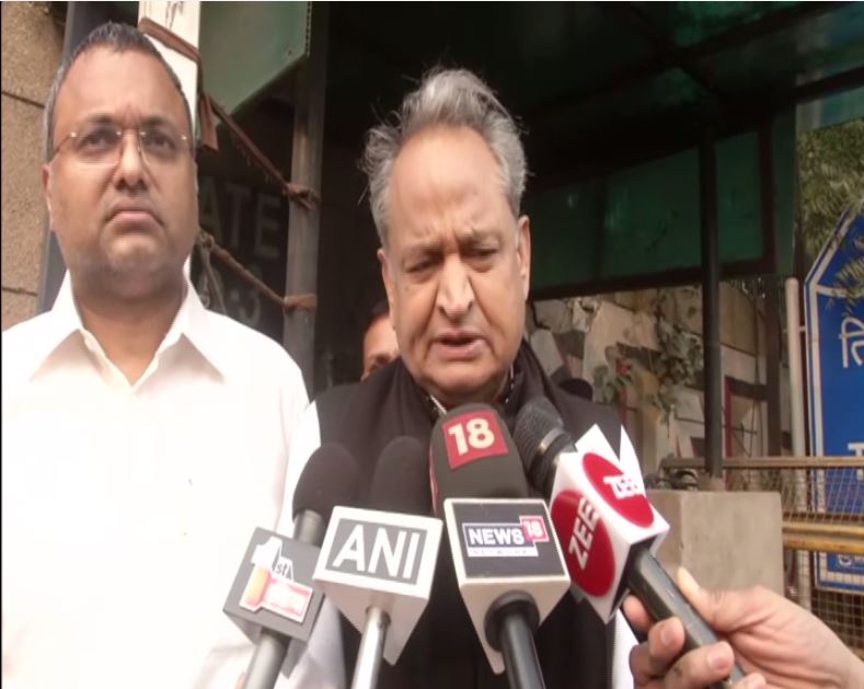 Ashok Gehlot with Karti Chidambaram, speaking to reporters in New Delhi on Friday. Photo/ANI
