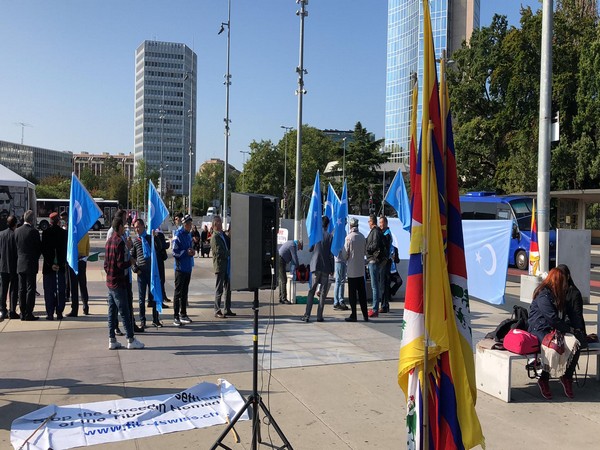 Activists unveil flags of Tibet and East Turkestan outside UN headquarters in Geneva  