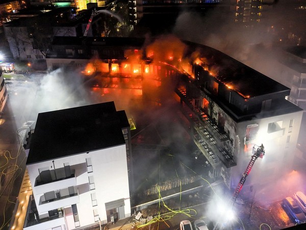Firefighters work to extinguish a fire in an apartment block, in Essen, Germany. (Photo Credit - Reuters)