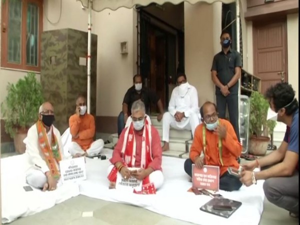 BJP's state unit president Dilip Ghosh and other leaders demonstrating against the State government in Kolkata on Sunday. Photo/ANI