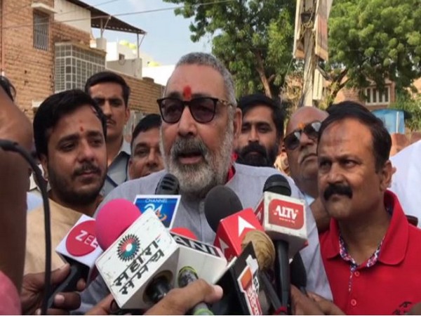 Union Minister Giriraj Singh speaking to reporters in Jodhpur on Sunday.