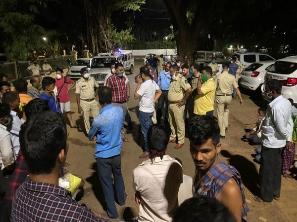 A group of around 150 migrant labourers gather in Panaji, Goa on Wednesday night. Photo/ANI