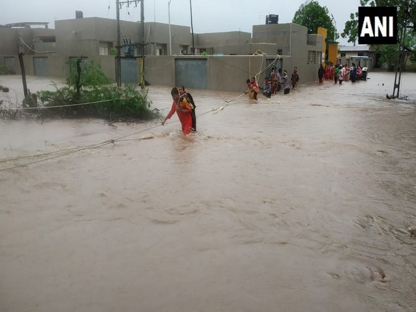 Visuals from NDRF personnel rescuing people in Gujarat.