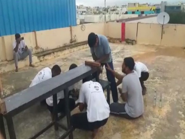 Prabhakar Reddy from Nellore set the world record by removing 68 bottle caps in a minute [Photo/ANI]