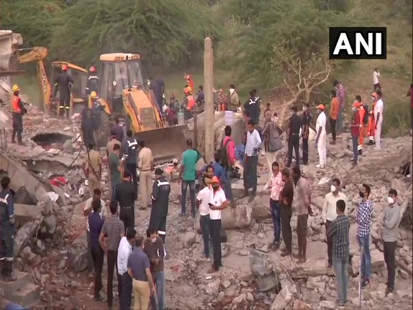 Rescue operation is underway at the godown in Ahmedabad. Photo/ANI