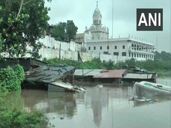    Over 2,500 people evacuated to safer places as water discharged from Sardar Sarovar Dam in Gujarat. Photo/ANI