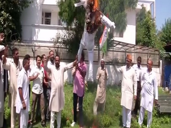 Protesters outside the Bharatiya Janata Party headquarters in Jammu on Wednesday. Photo/ANI