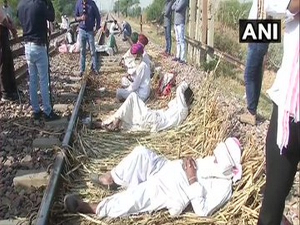 Gurjar protestors blocked railway tracks in Bharatpur on Monday. (Photo/ANI)