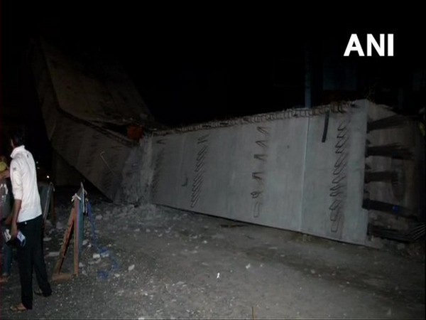A section of an under-construction flyover collapses in Gurugram's Sohna Road on late Saturday night. 