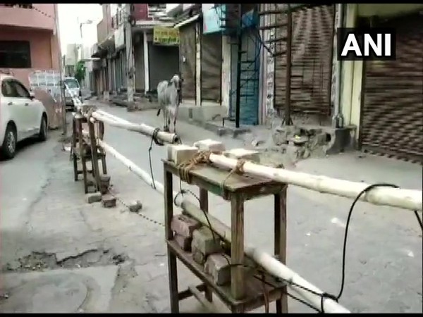 Barricading done at containment zones in Gurugram (photo/ANI)