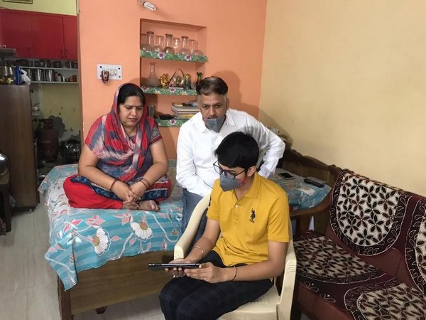 Shivam with his parents attending happiness classes in Delhi on Saturday. Photo/ANI