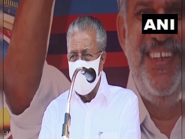 Kerala chief minister Pinarayi Vijayan addressing a public gathering in Kasargod on Saturday. (Photo/ANI)