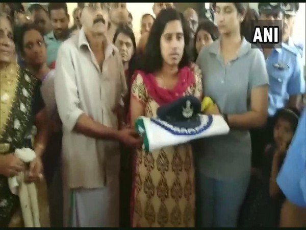 H Vinod's family members gathered for receiving his mortal remians in Coimbatore (photo/ANI)
