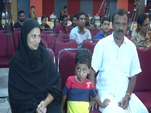 Three-year-old Mohammad Haidan with his parents in Kochi on Thursday. Photo/ANI