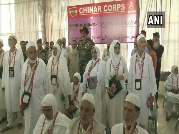 Lieutenant General KJS Dillon, General Officer Commanding (GOC) of 15 Corps, with Hajj pilgrims in Srinagar on Monday. Photo/ANI