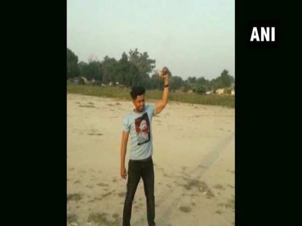 Man seen firing from a country-made pistol on a TikTok video.