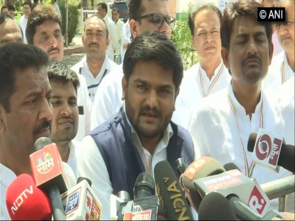 Patidar agitation leader Hardik Patel talking to reporters in Ahemdabad on Tuesday. (Photo/ANI)