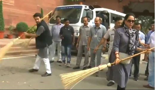 BJP MP Hema Malini at a cleanliness drive at Parliament along with MoS Aurag Thakur on July 13. (Photo/ANI)