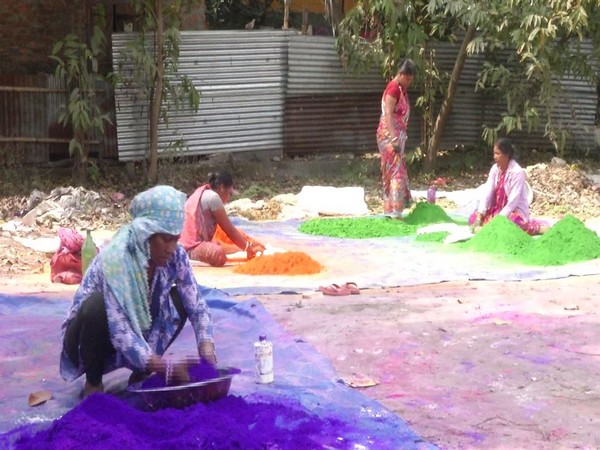 Workers making natural colours for Holi in Siliguri. Photo/ANI
