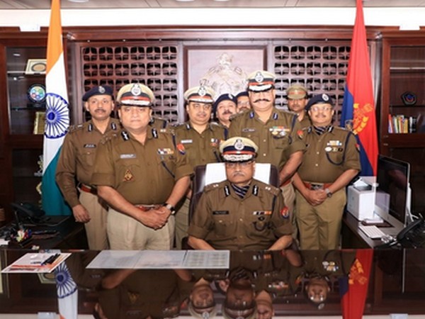 Hitesh Chandra Awasthi (sitting on chair) takes charge as interim DGP of Uttar Pradesh.