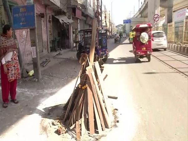 A holy bonfire being set in Maujpur in North-east Delhi (Photo/ANI)