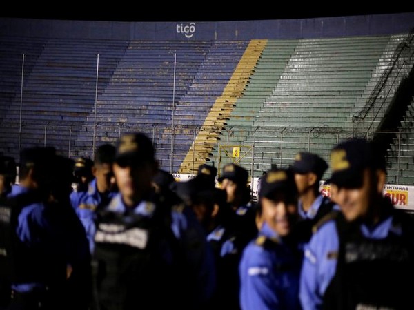 Police officers inside the National Stadium in Tegucigalpa on Saturday 