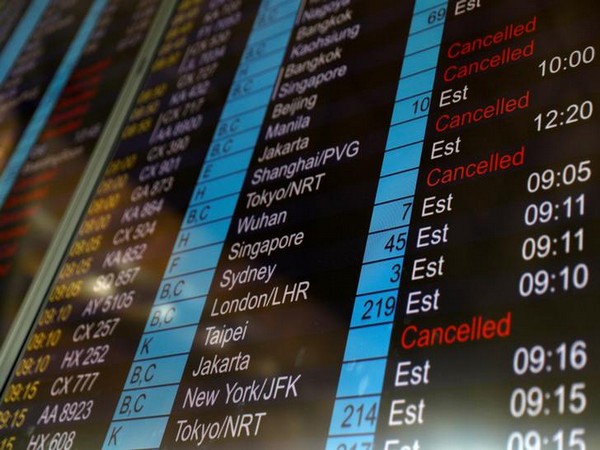 Flight information board at Hong Kong airport on Tuesday  