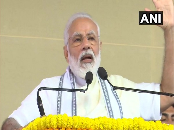 PM Modi addressing people at Belur Math, Howrah on Sunday.