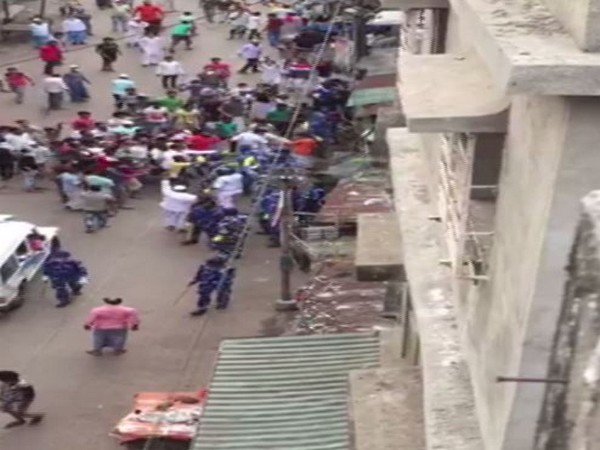 Mob attacking police in Howrah in West Bengal on Tuesday. Photo/ANI