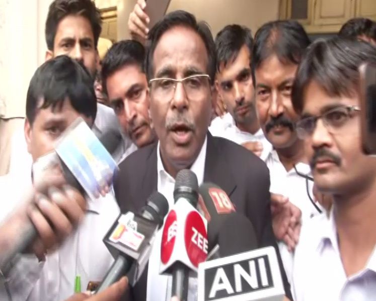 Advocate Hukam Chand Sharma speaking to reporters in Alwar on Wednesday. Photo/ANI