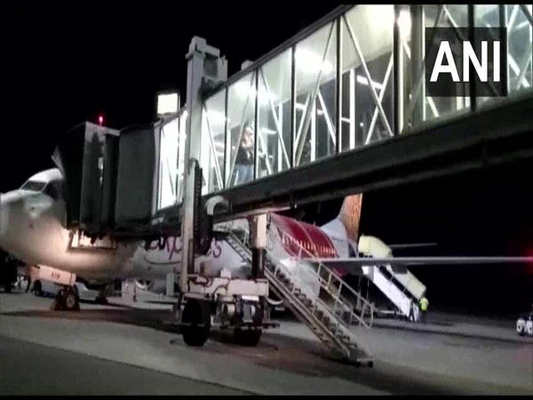 Passengers arrive in Hyderabad from Muscat in Oman under Vande Bharat Mission on Monday.