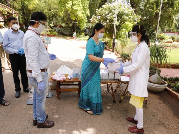 Jayanthi Mallya, President of SCRWWO, distributing safety kits to Paramedical staff in Hyderabad on Saturday. (Photo/ANI)