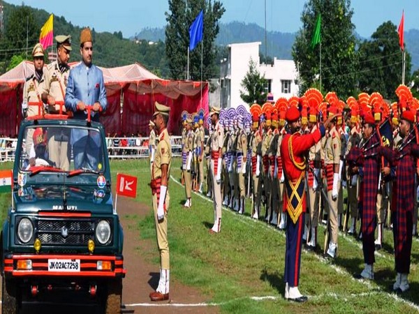 Deputy Commissioner Mohammad Aijaz Asad takes salute of the march past. Photo/ANI