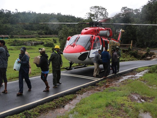 Image courtesy- IAF, Indian Airforce team carries relief material for flood-affected people.