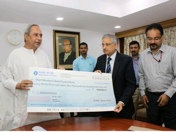 Odisha Chief Minister Naveen Patnaik with AIIMS Director Randeep Guleria