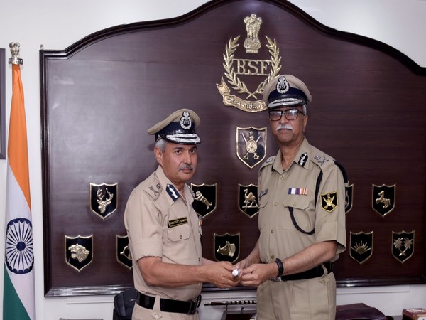 Surjit Singh Deswal, left, while taking the charge of Director General of Border Security Force. Photo/ANI