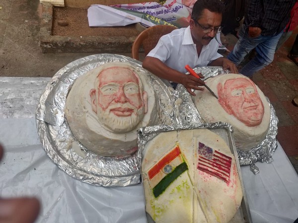Chef Iniavan with three massive idlis to welcome the US President. Photo/ANI